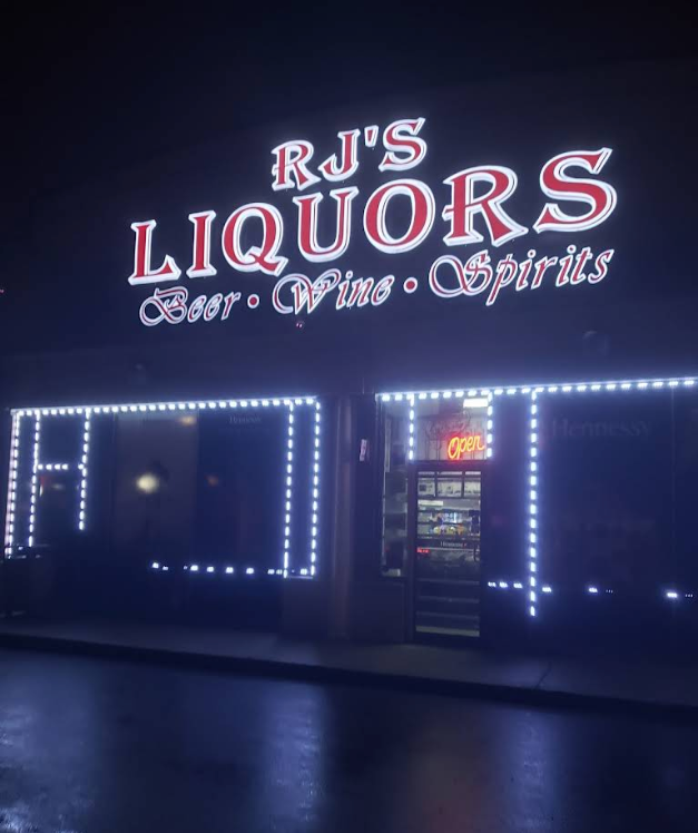 RJ's Liquors Storefront - Night